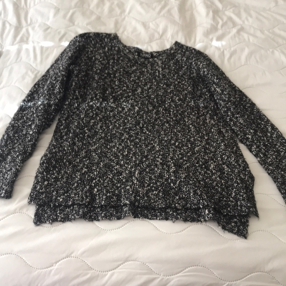 Gently worn grey sweater